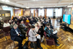 Раиса Усович представляет свою книгу участникам областной краеведческой конференции